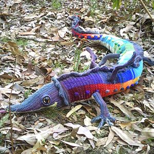 A fabulous, crochet rainbow dragon who is 2m long