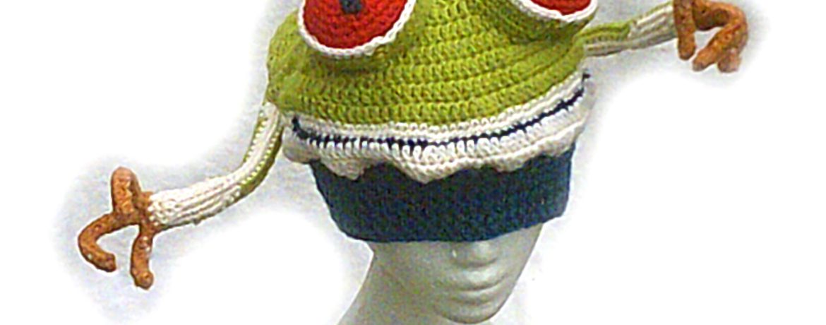 Holly Hangon, a green tree frog hat.