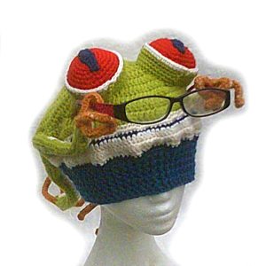 Holly Hangon the green tree frog beanie, holding my spectacles