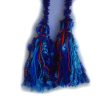 The fluffy, luxuriant blue tassels dance from fuzzy, handtwisted ties.
