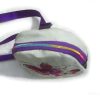 The bag closes with a sturdy purple zipper, which has matching rainbow-toned teeth.